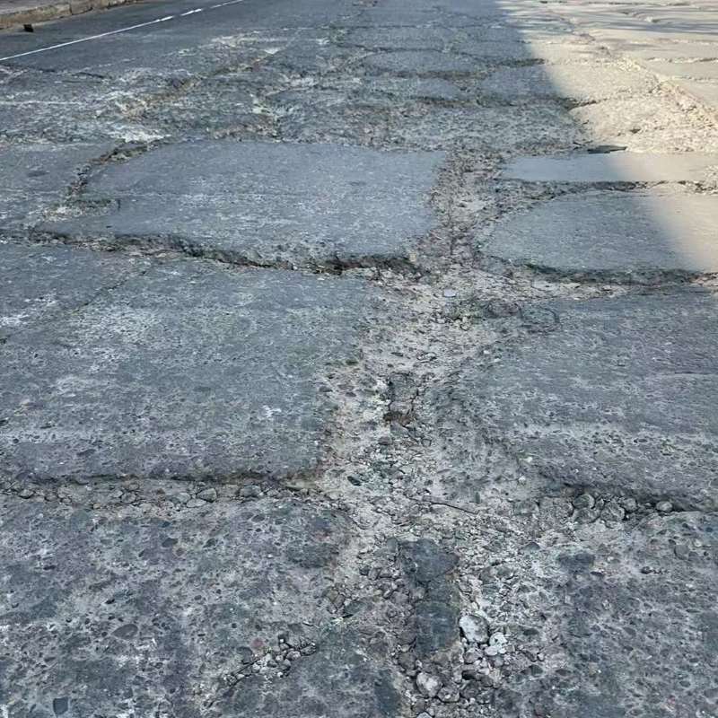 上思路面起砂露石子修补料